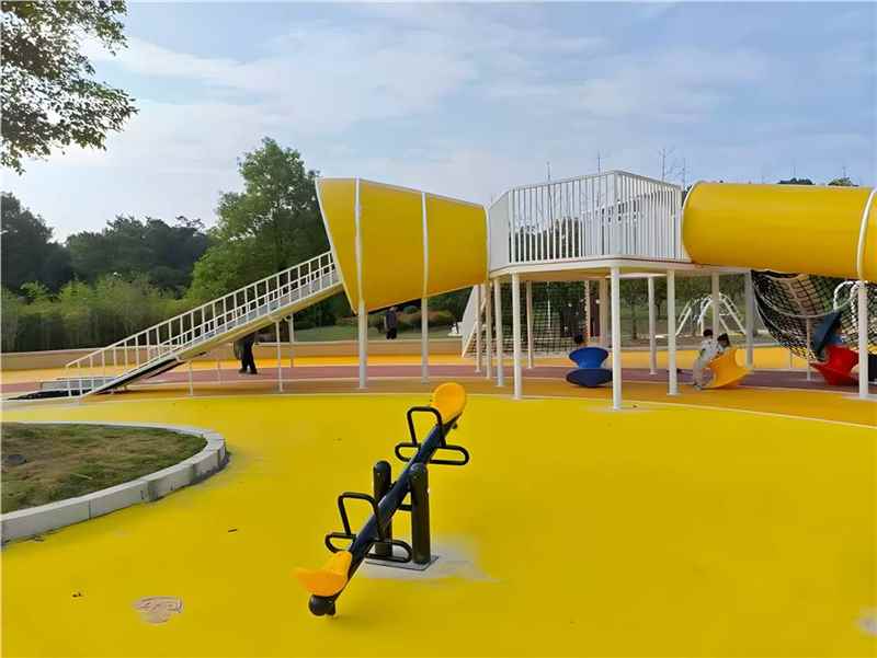 Outdoor playground project with slide and climbing structure