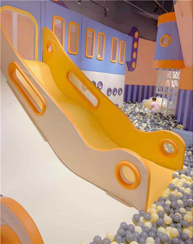 Soft play house with mini slide and toddler activity area
